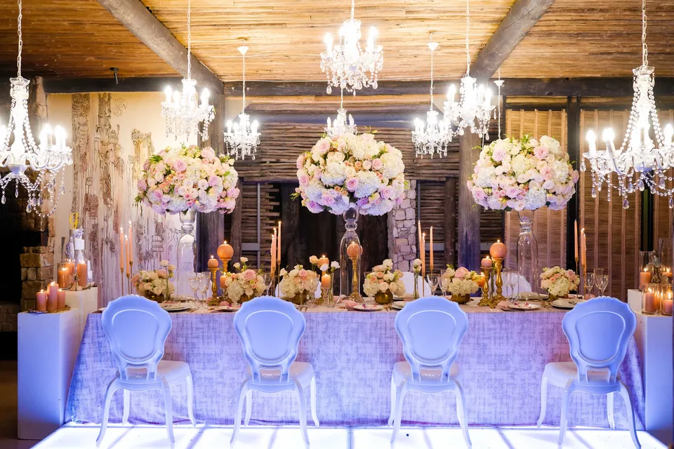 Pastel floral tablescape and crystal chandeliers for a lifestyle celebration