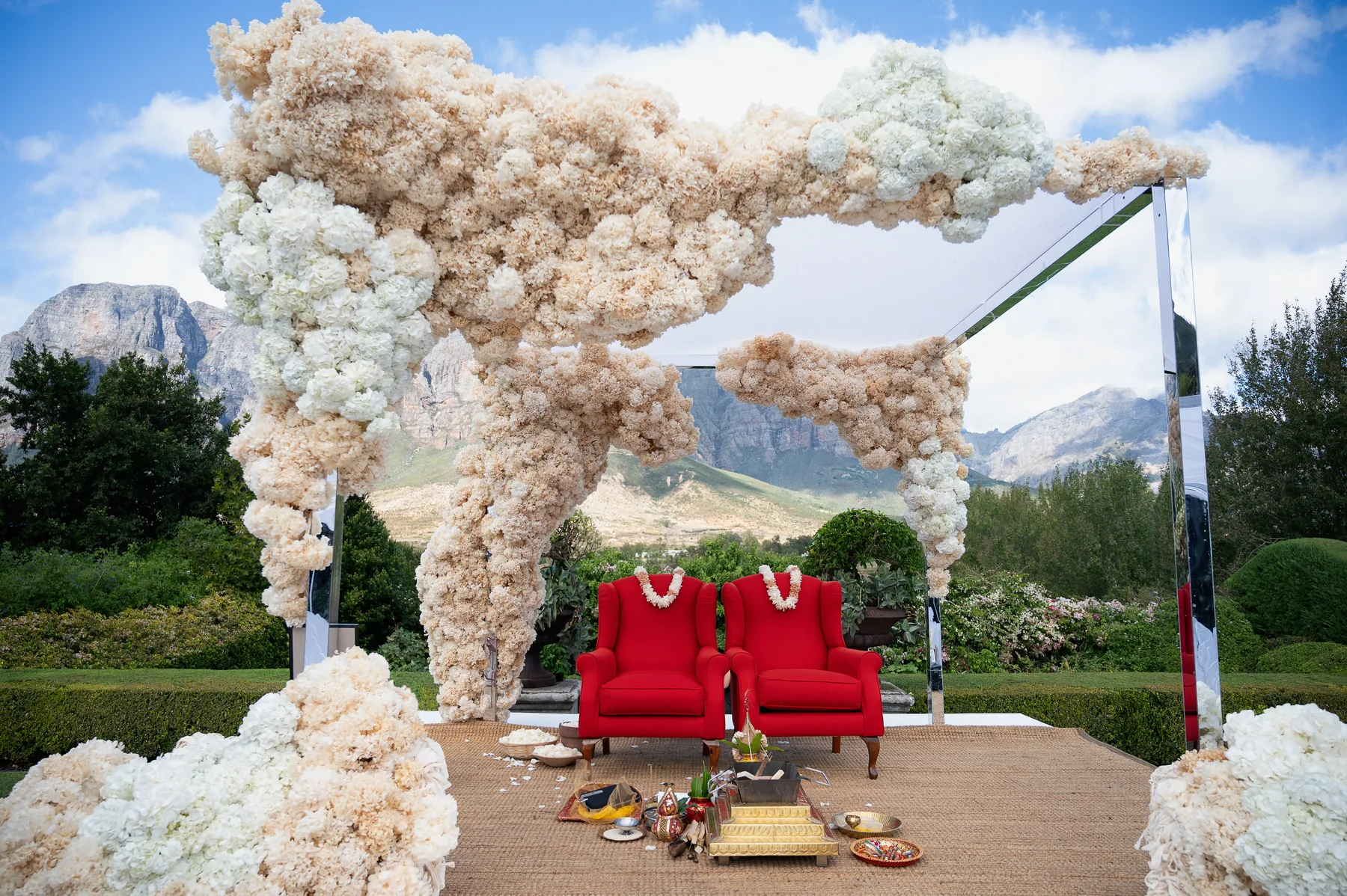 Floral ceremony setting against the mountain landscape