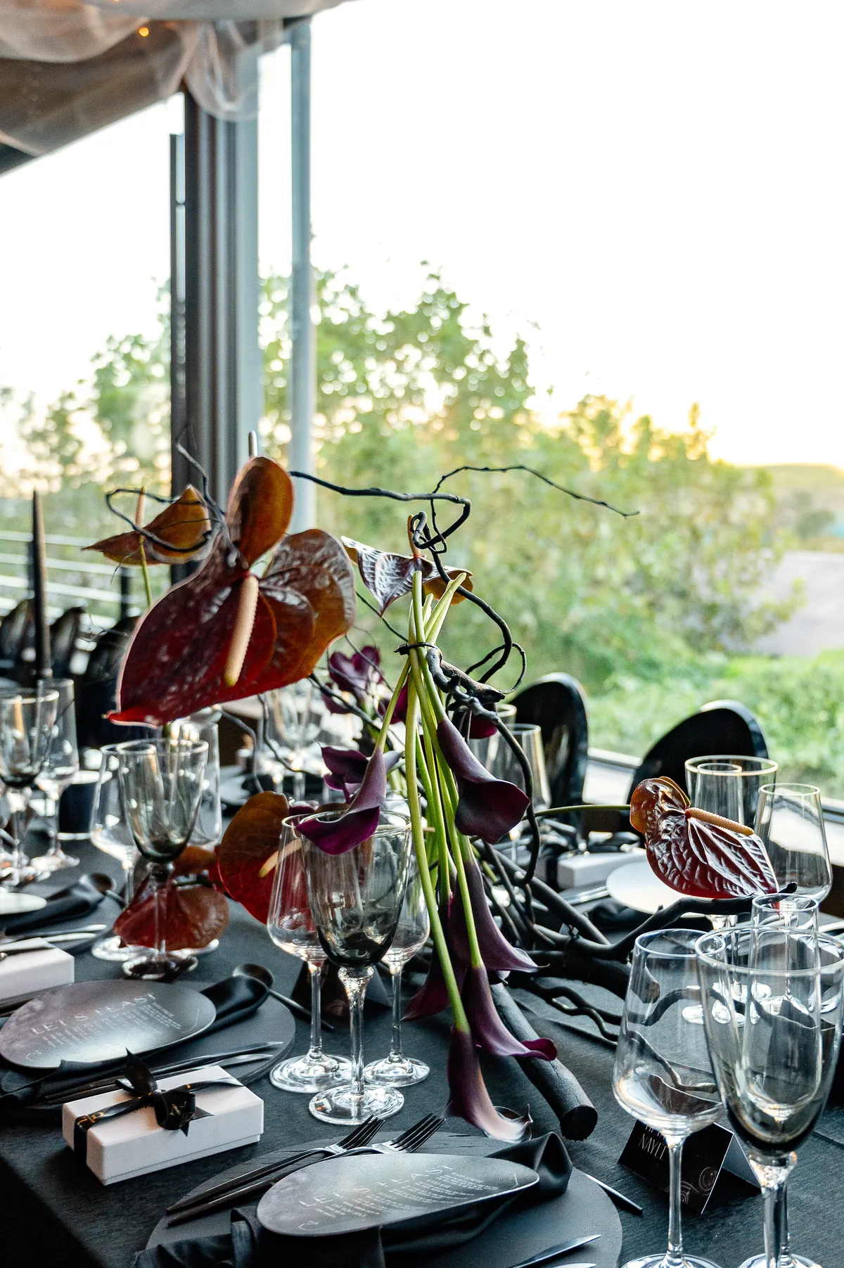 Sculptural table arrangement in jewel tones