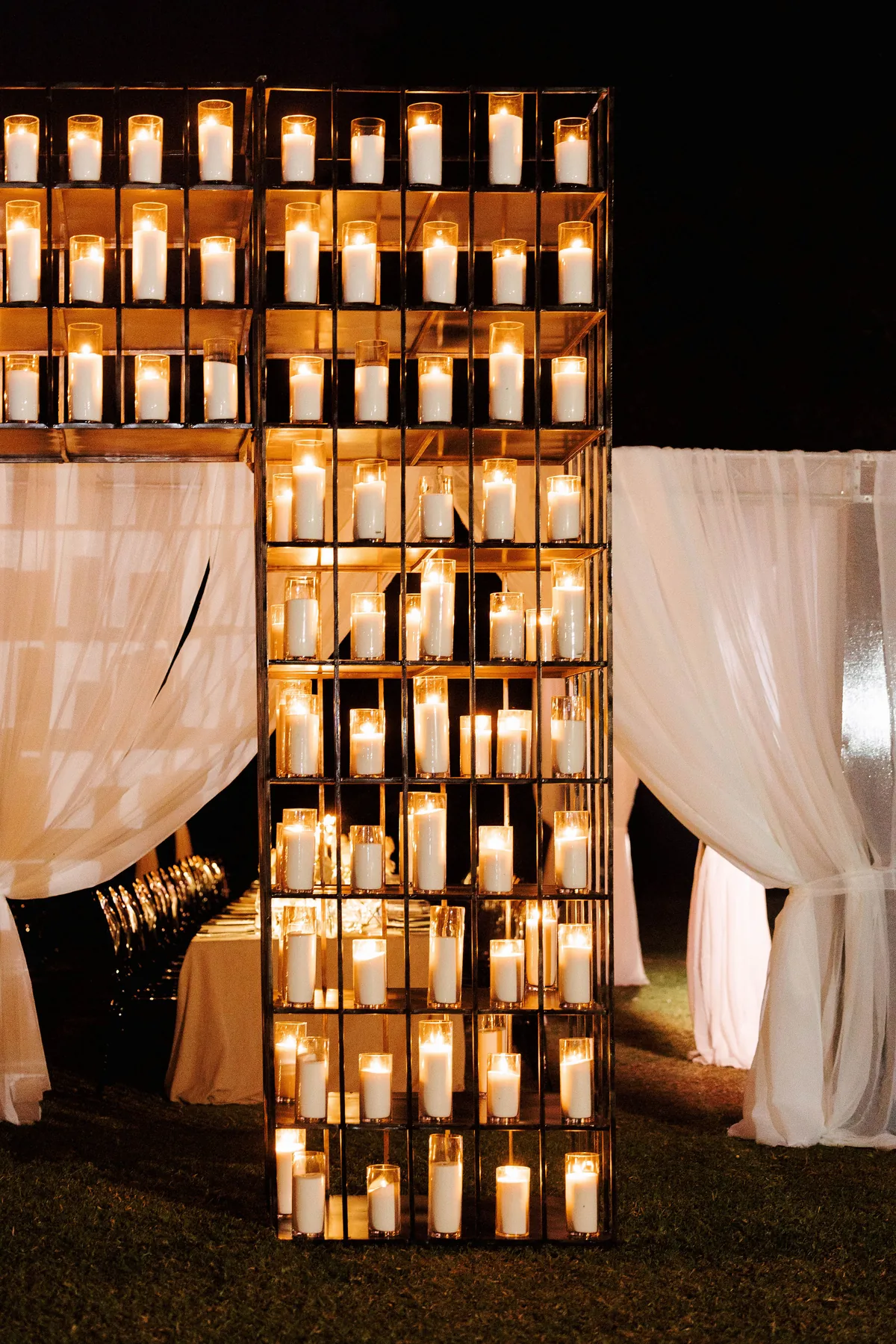 Towering candle installation at the evening reception