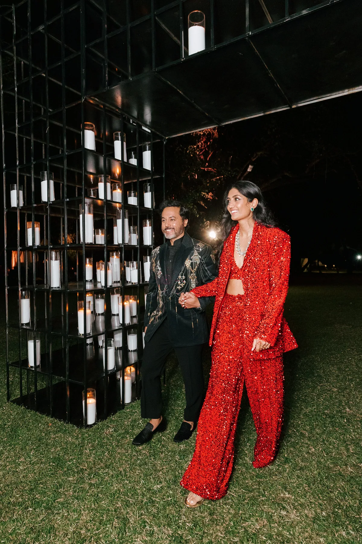 Guests arriving beside the candle installation