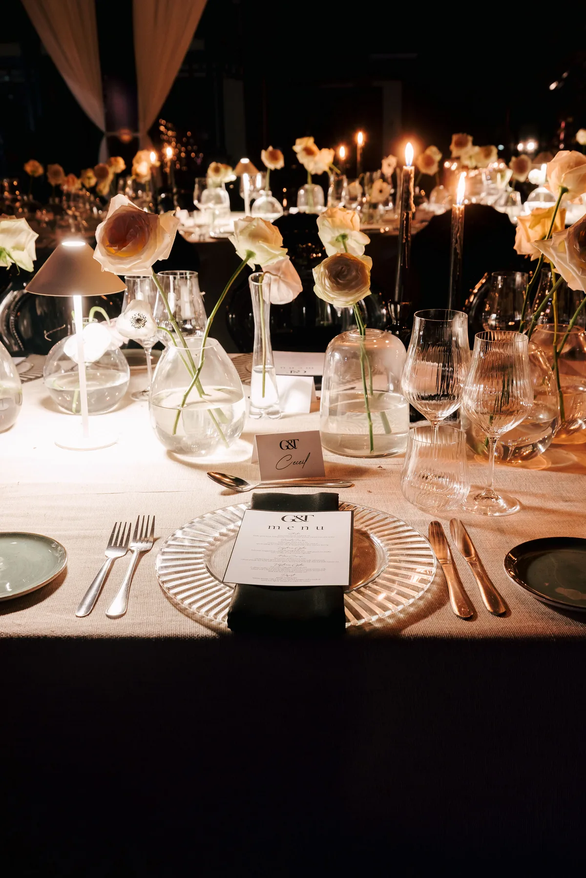 Layered floral and candlelight tablescape