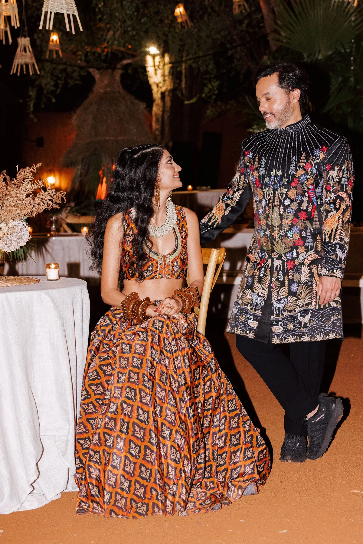 The couple sharing a moment during dinner