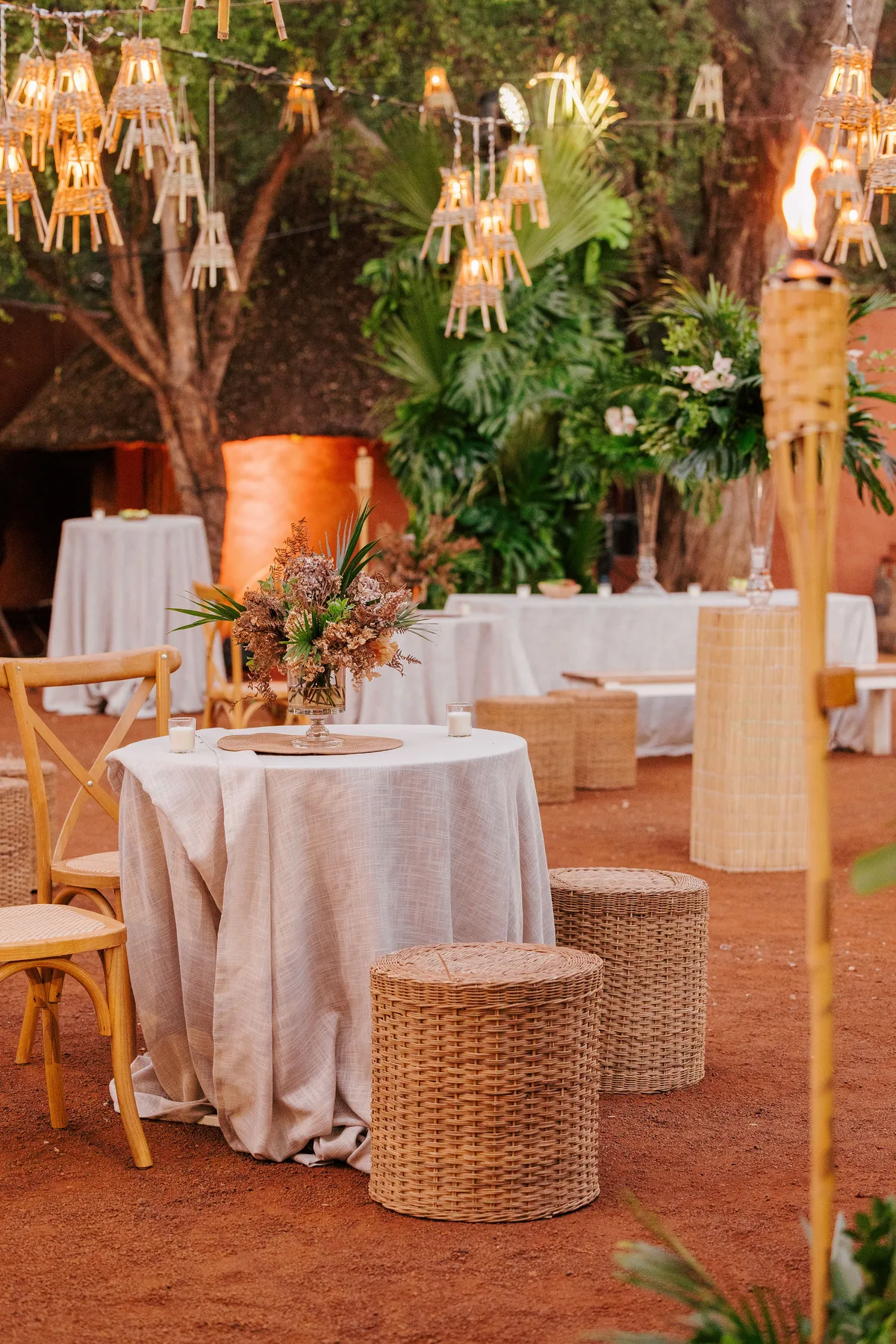 Richly coloured outdoor reception setting